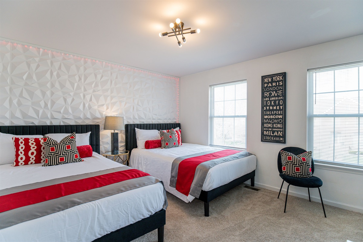 Our double queen room is spacious, comfortable, and ideal for longer stays.