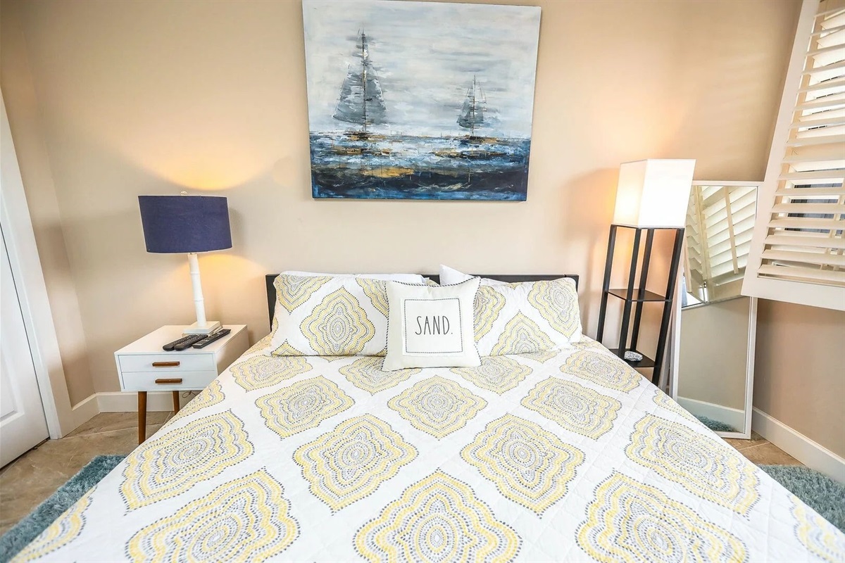 Overhead shot of plush bedding and stylish bedroom layout.