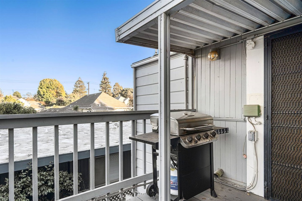 A large four burner propane BBQ is available on the spacious private deck.