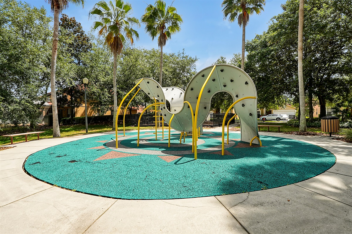 Clubhouse vibrant, zero-entry splash pad offers a safe and exhilarating space for little ones to cool off and make a splash while you watch from the shade 