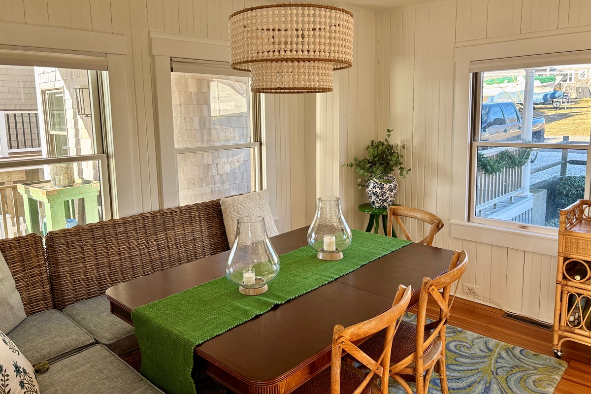 Enjoy meals together in this bright, cozy dining area with coastal charm. 🍽️