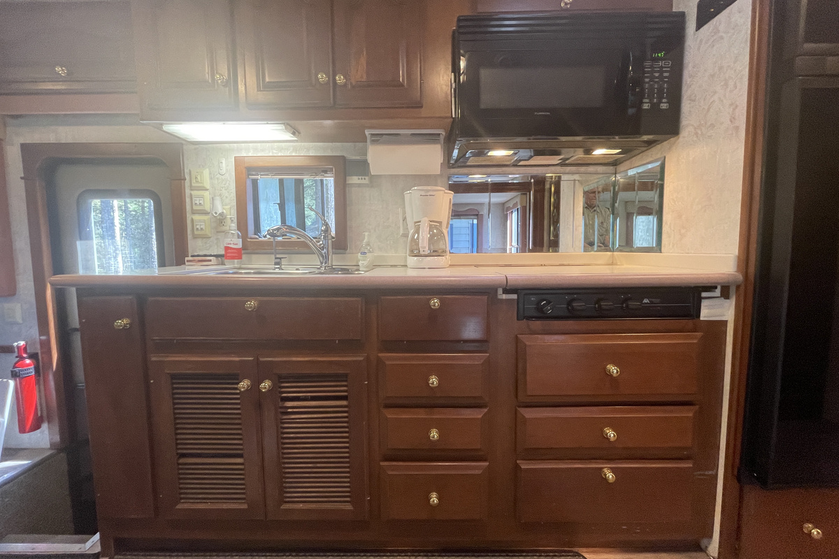 Kitchen sink, New Convection/Microwave Oven and Gas Stove Top