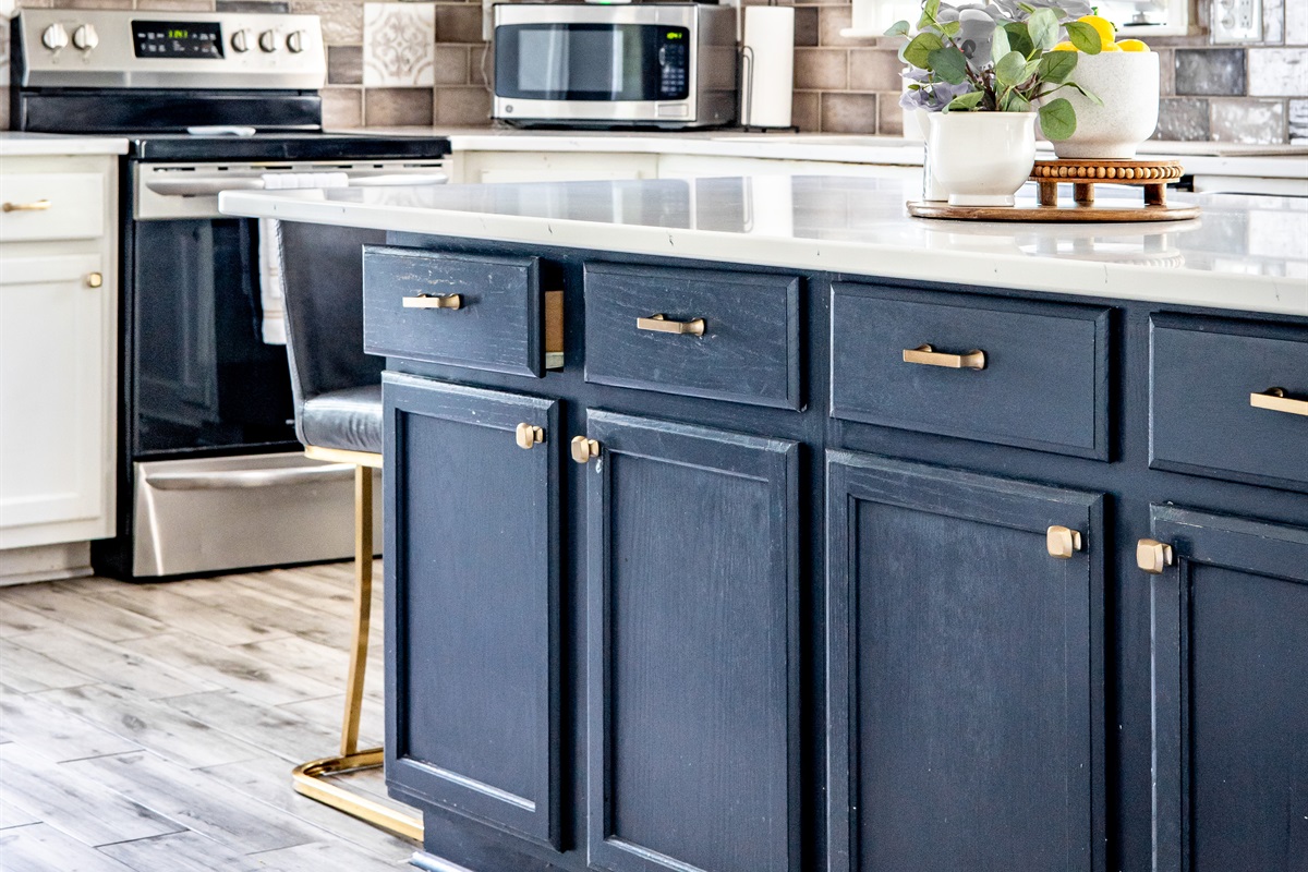 Kitchen with island and barstools