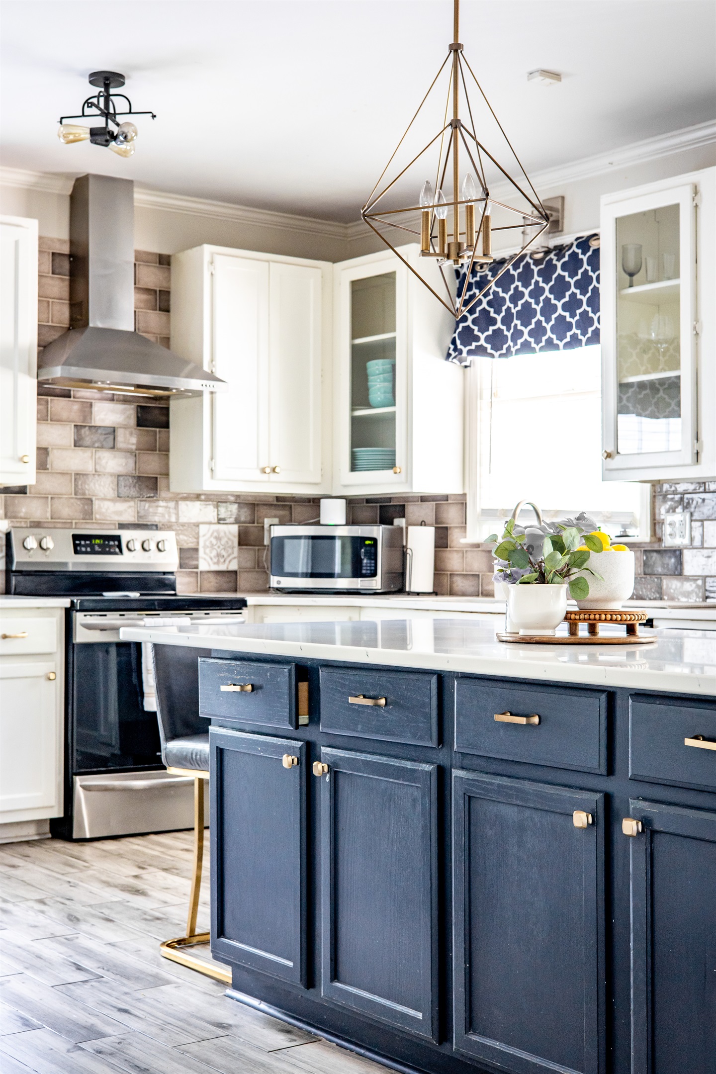 Kitchen with island and barstools