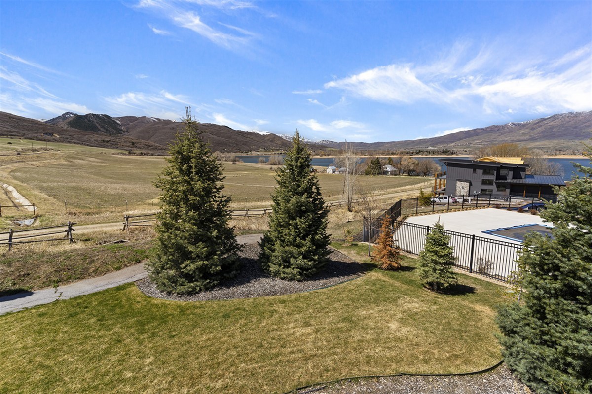 Beautifully landscaped grounds offer a welcoming first impression, with manicured greenery, open space, and seamless access to the community’s upscale amenities.