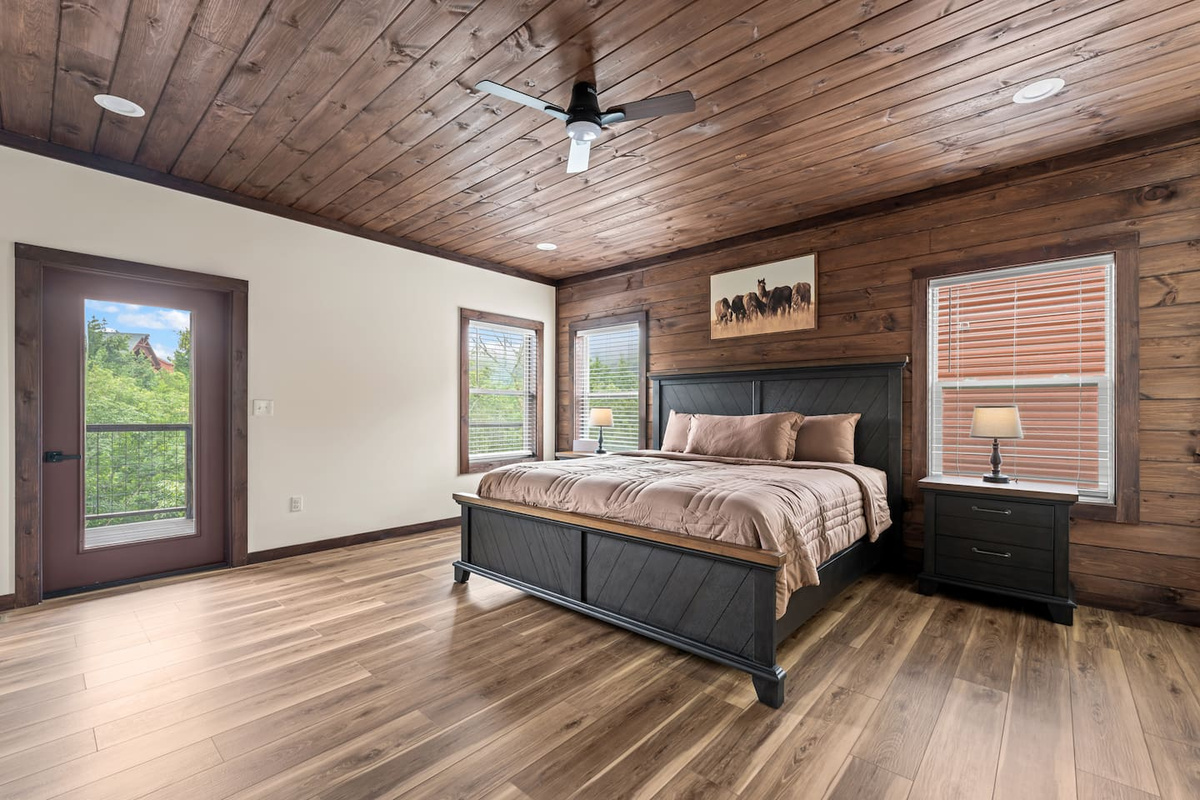 master king bedroom featuring mountain views