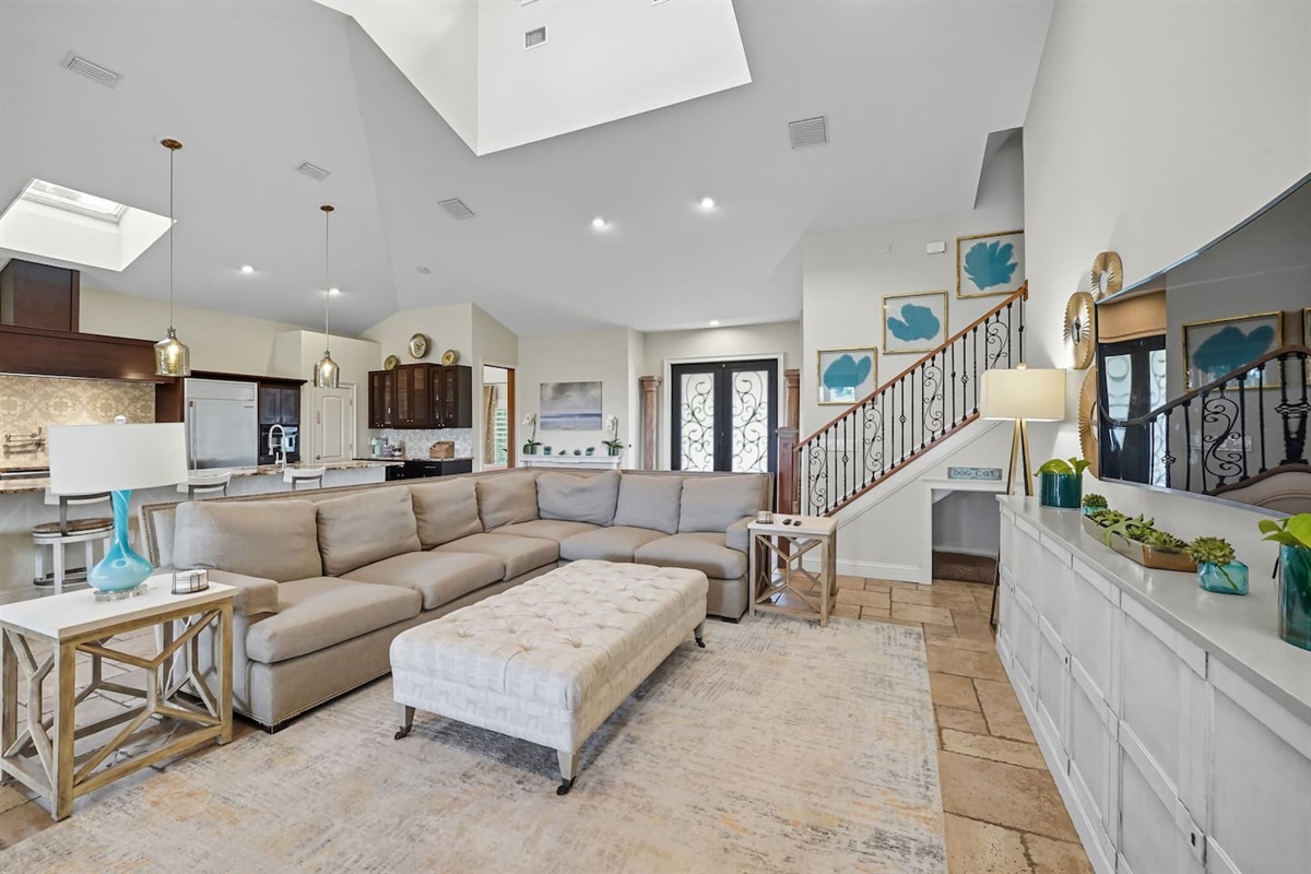 Spacious living room with seating for everyone.  enjoy cocktails or more in style and comfort.  