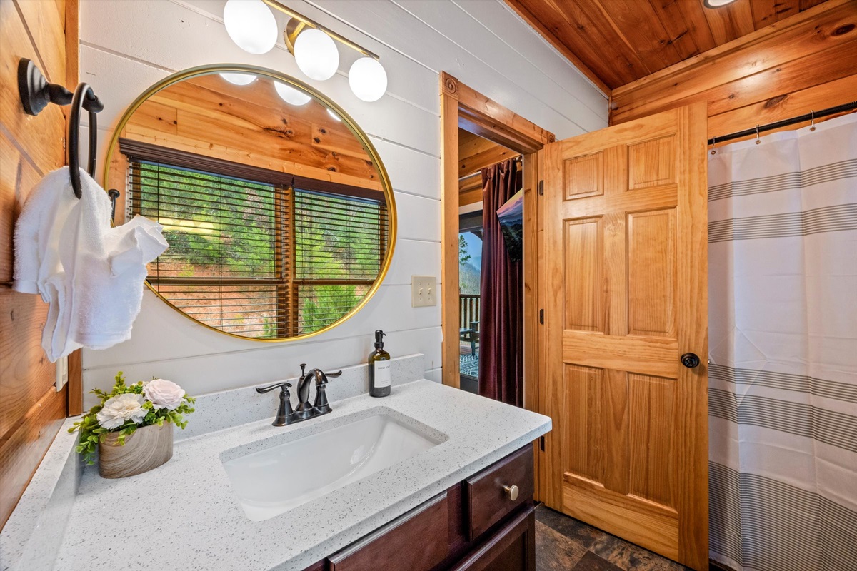 Bedroom 4 has a private bathroom with tub/shower