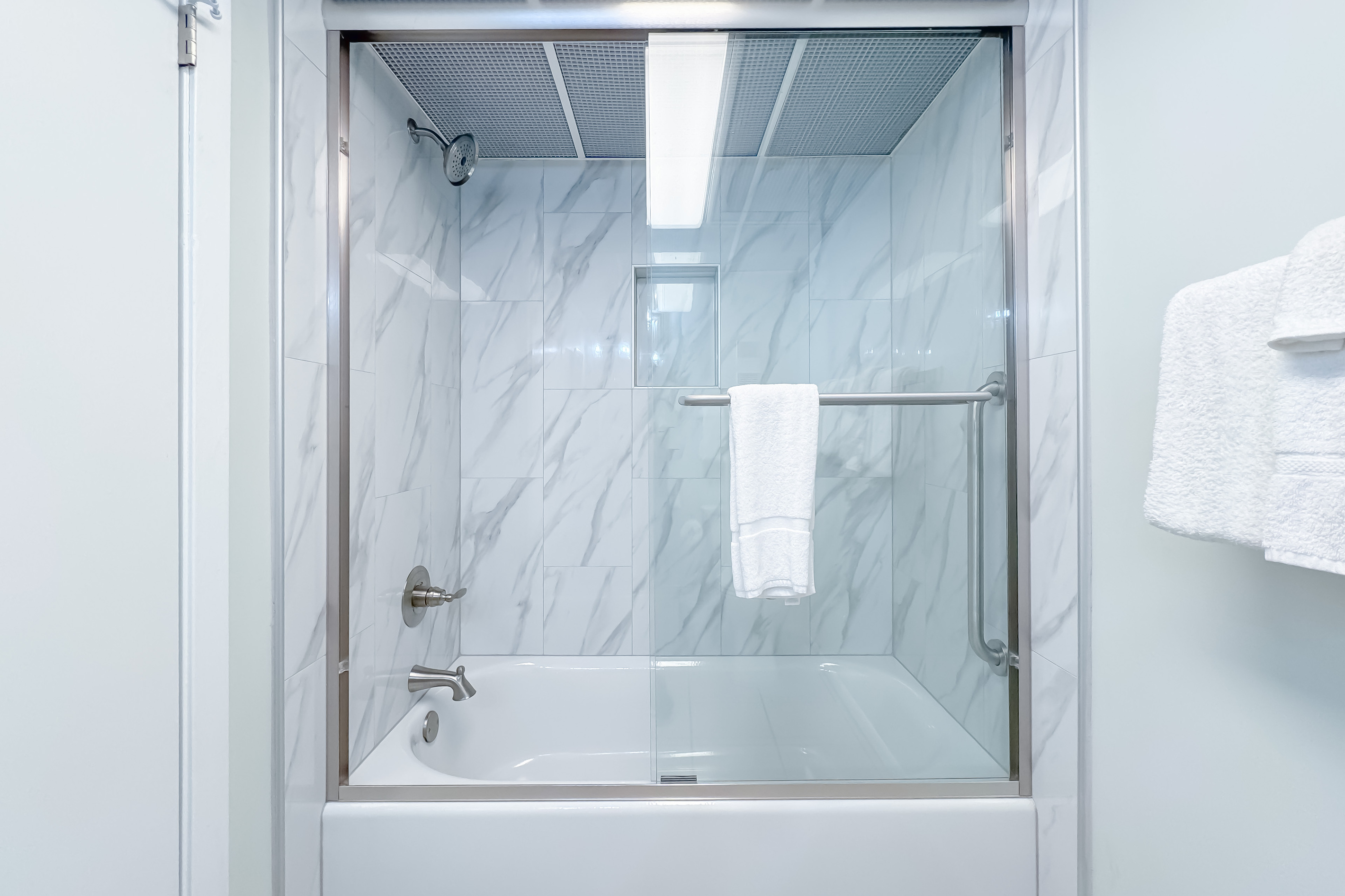 updated in 10/2026-Tiled in bathtub  Clean lines and thoughtful design provide a relaxing experience.