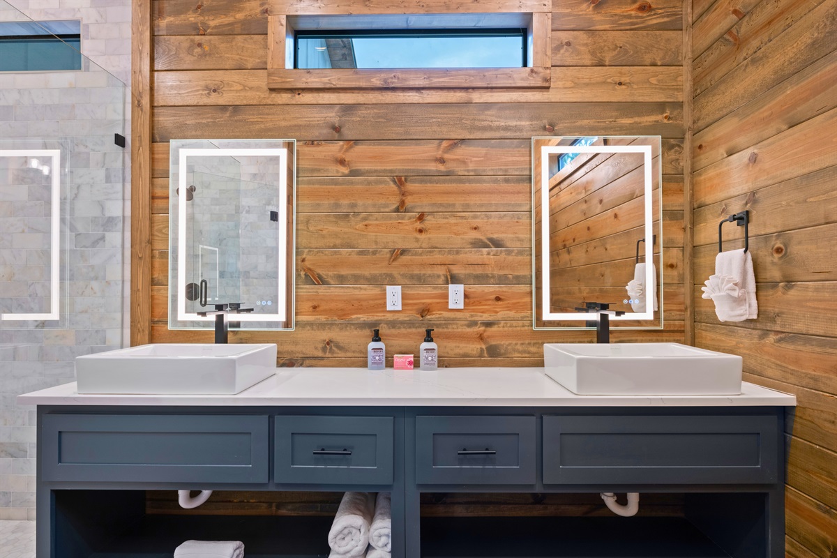 Dual sinks and spacious counters in Bathroom 2.