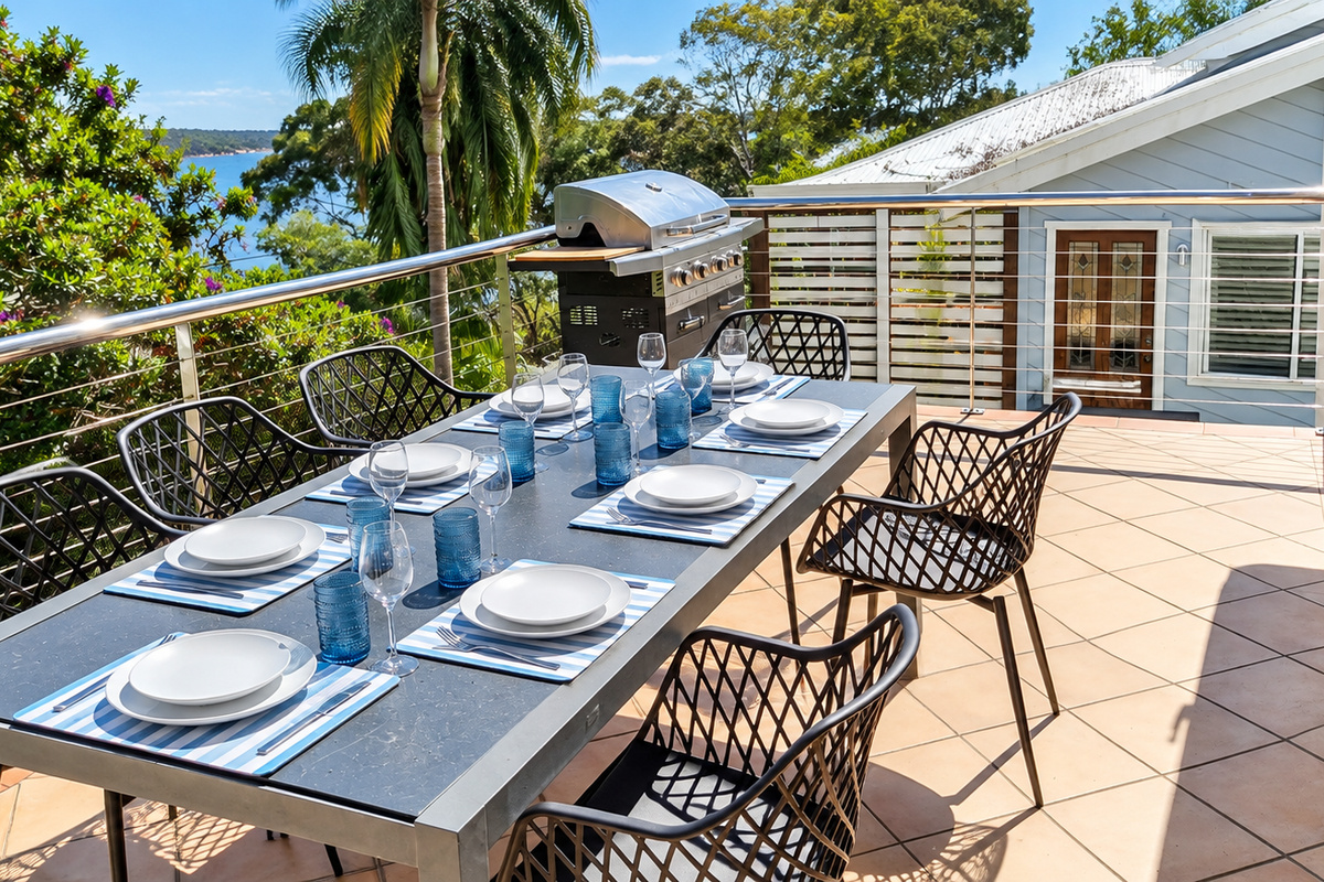 Enjoy alfresco dining on the sun-filled terrace, complete with a barbecue and beautiful water views.