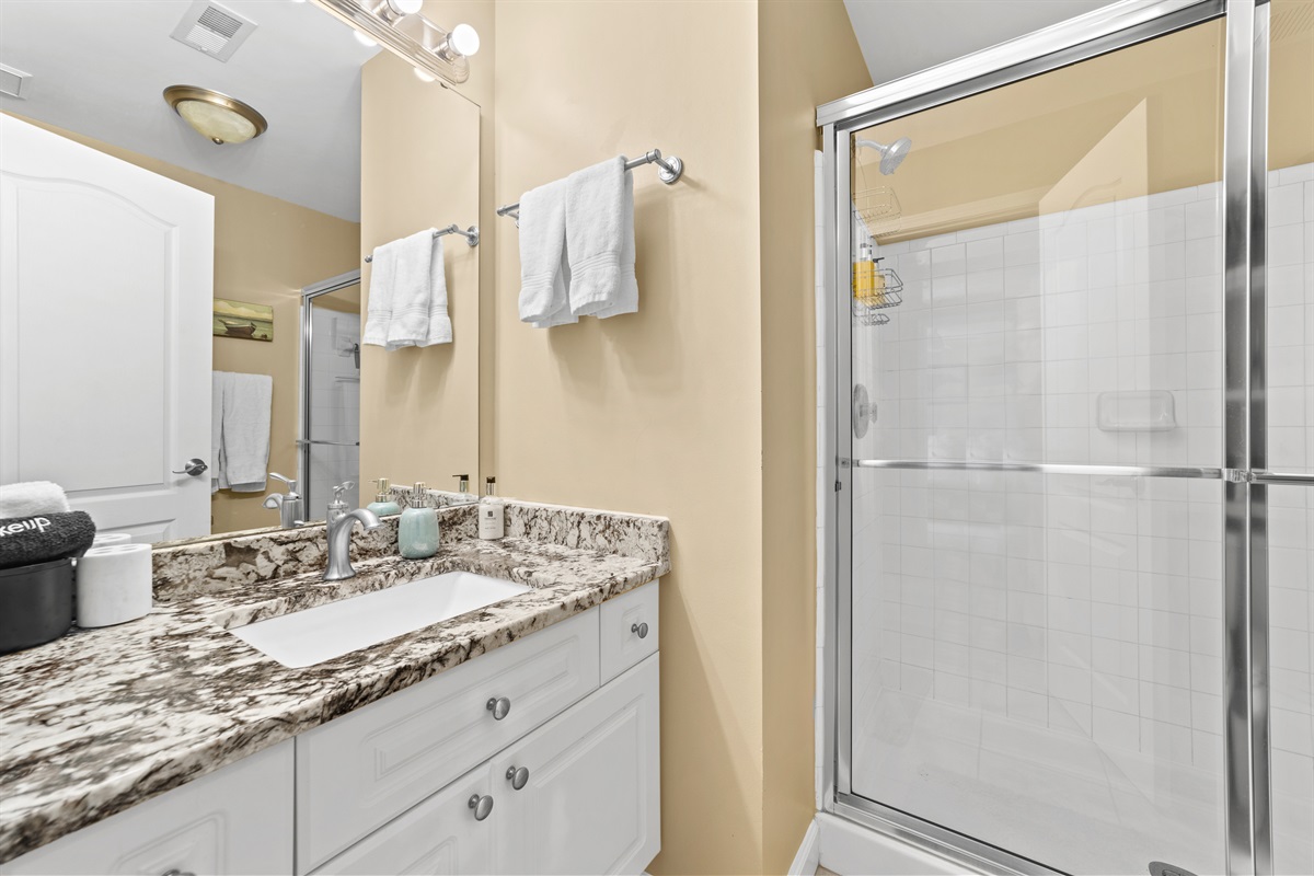 The spacious guest bathroom