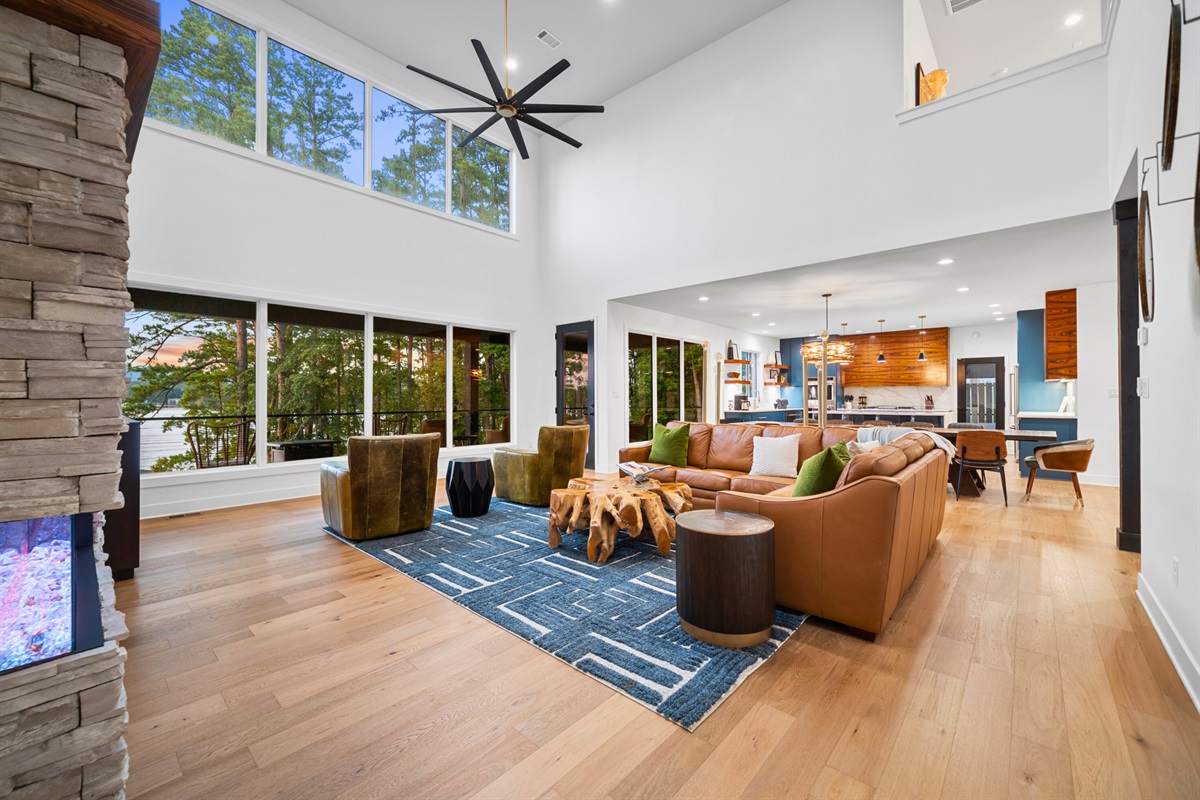 An open living area with floor-to-ceiling windows and plenty of space to gather.