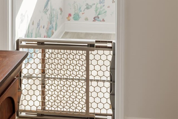 The kid's playroom is a large closet with a window that's attached to the 2nd bedroom.