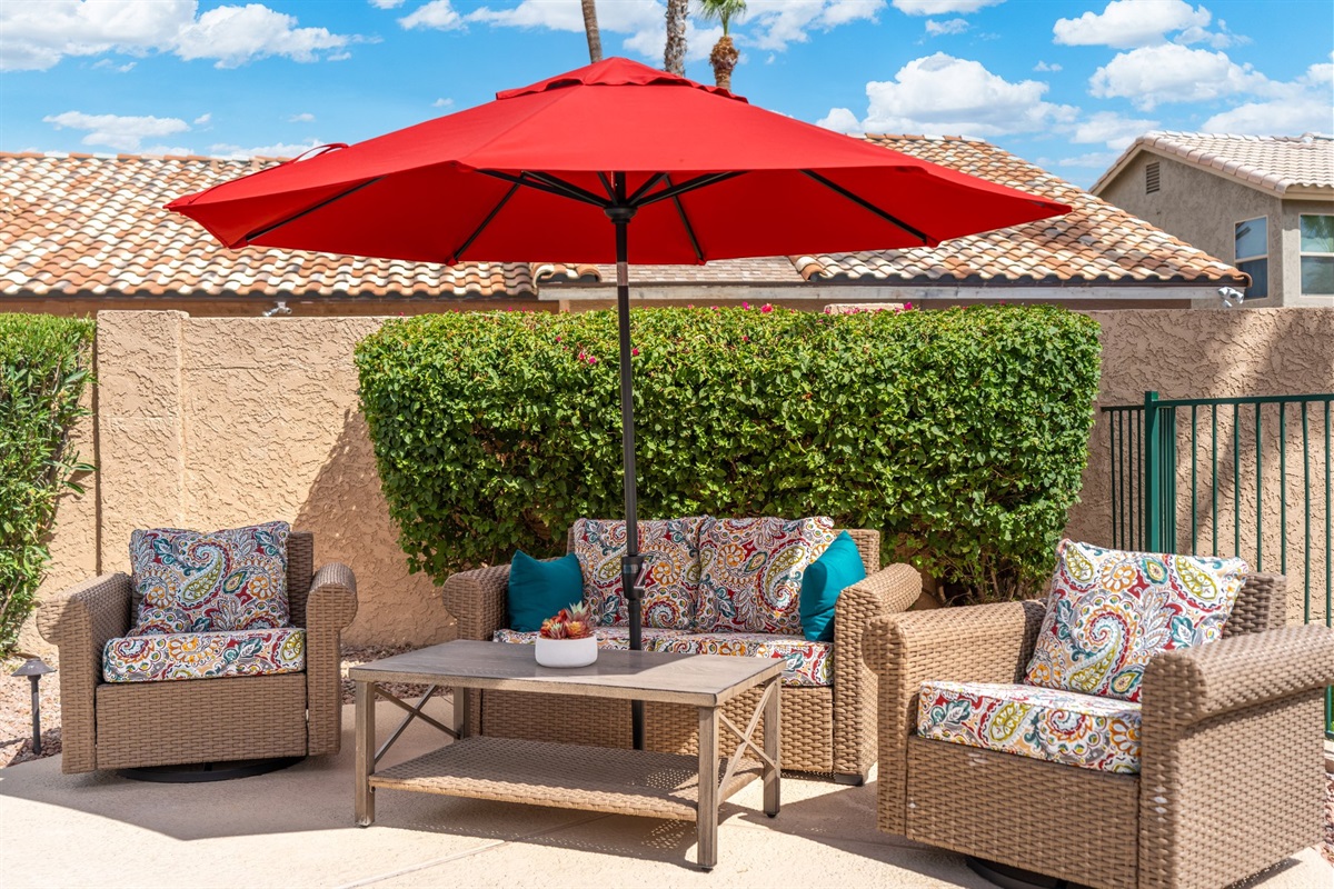 Outdoor seating to watch over the pool.