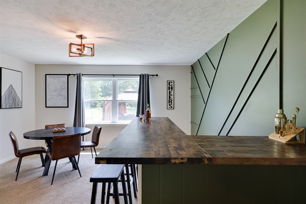 Enjoy a refreshing drink at the private bar. Vacation at its finest!