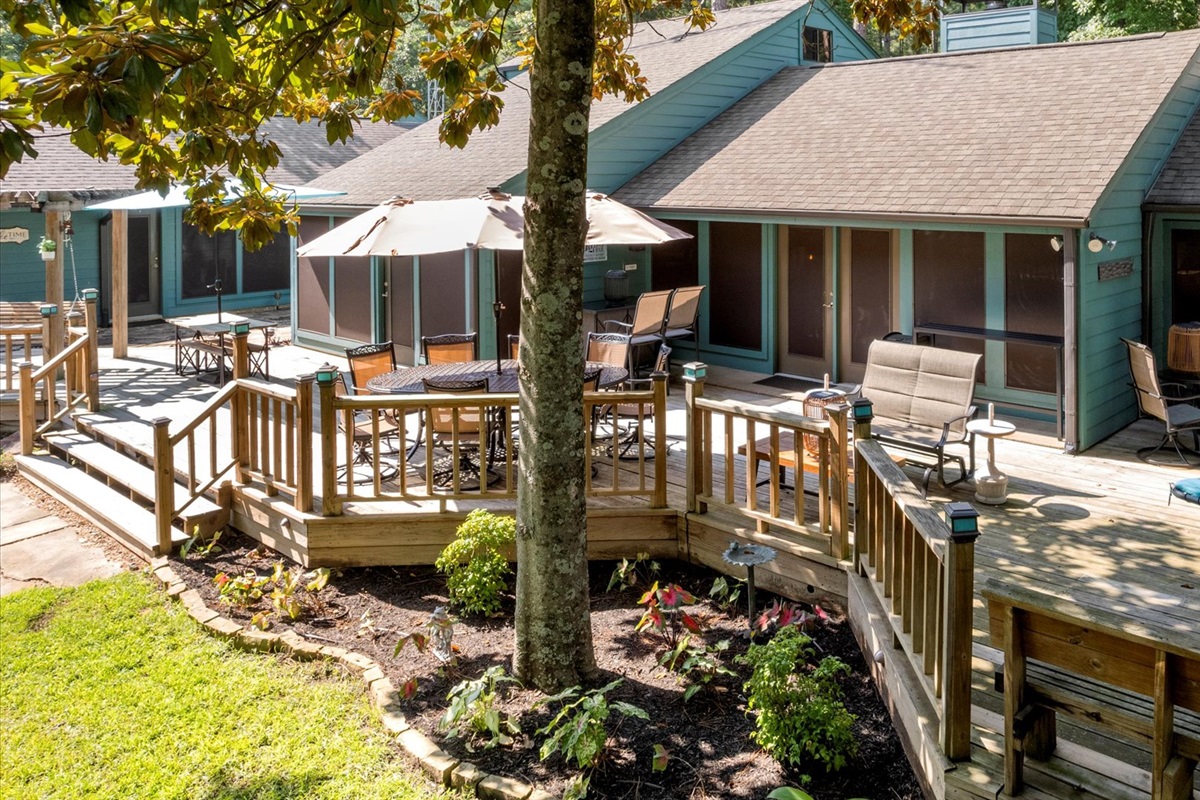 The patio is super spacious, offering plenty of room to spread out and enjoy the outdoors. You'll find multiple dining areas and a variety of fun, comfy chairs—perfect for everything from family meals to lounging in the sun with a good book.