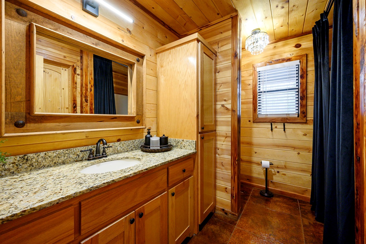 Bathroom: 
Well-appointed bathroom with quality finishes and clean, modern touches. Functional, stylish, and designed for comfort.