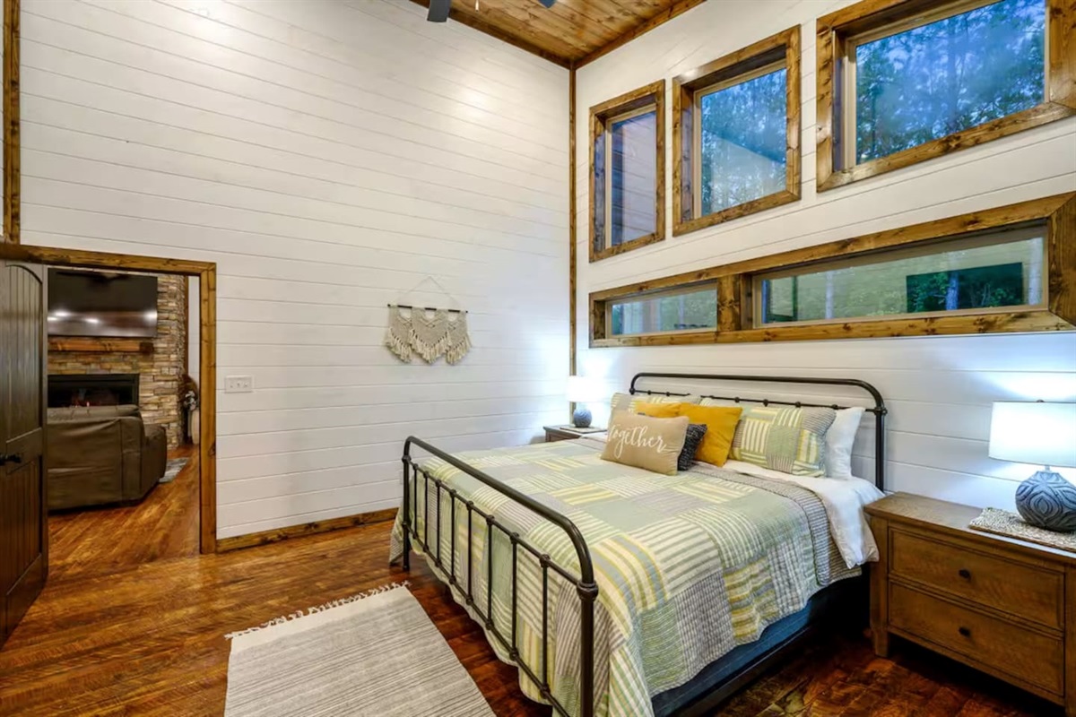 Steps from the living room, this cozy bedroom offers easy access and a peaceful retreat—perfect for relaxing after movie nights or family time.