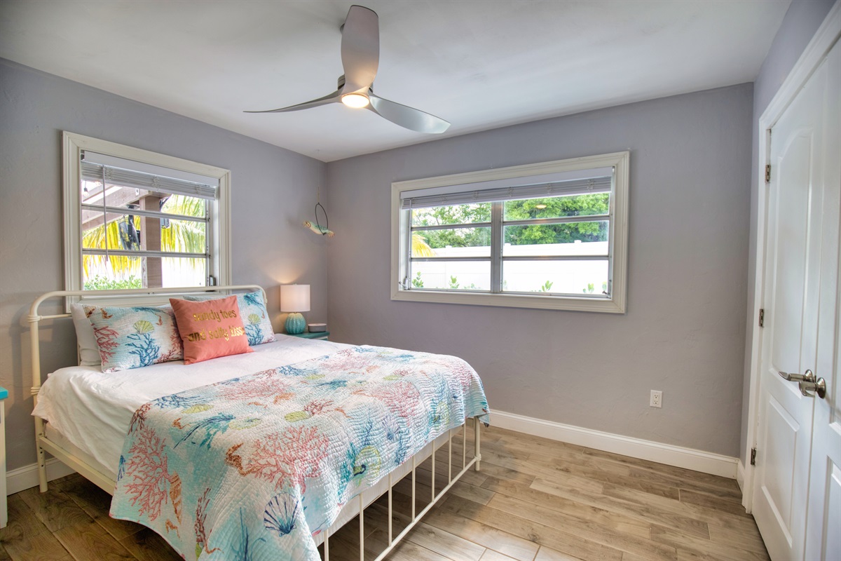 SECOND BEDROOM - Children's games and books located inside the closet along with an air mattress and a pack n play.