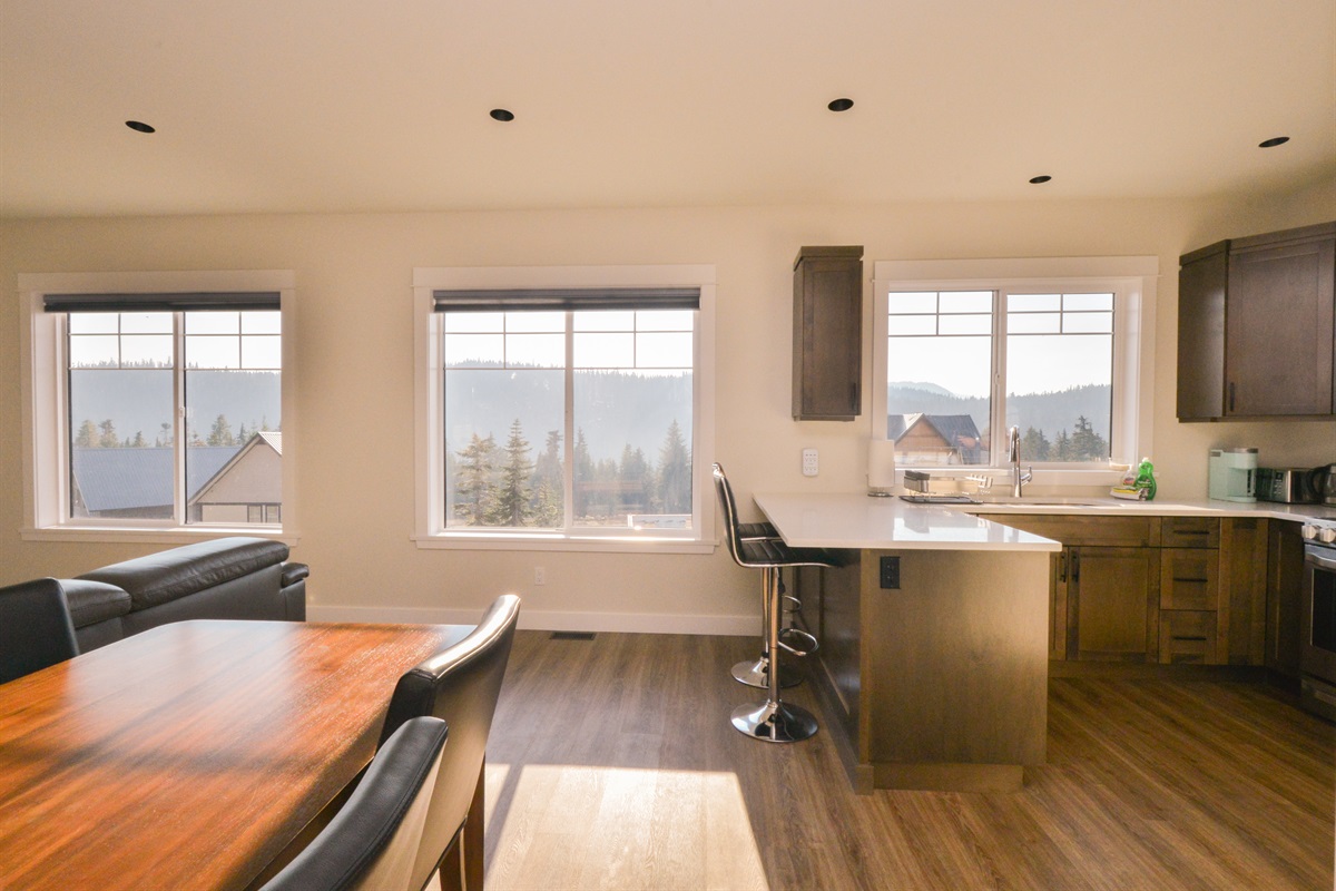 Unwind with morning coffee and panoramic mountain views