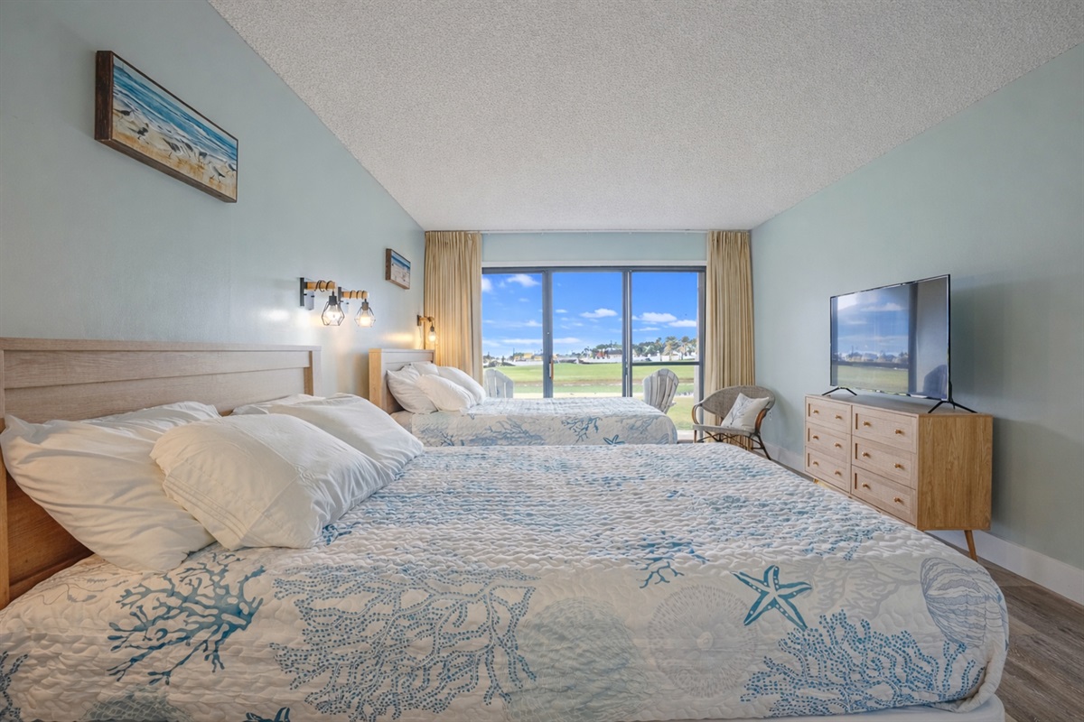 Bedroom with two queen beds, ensuite bathroom and smart TV
