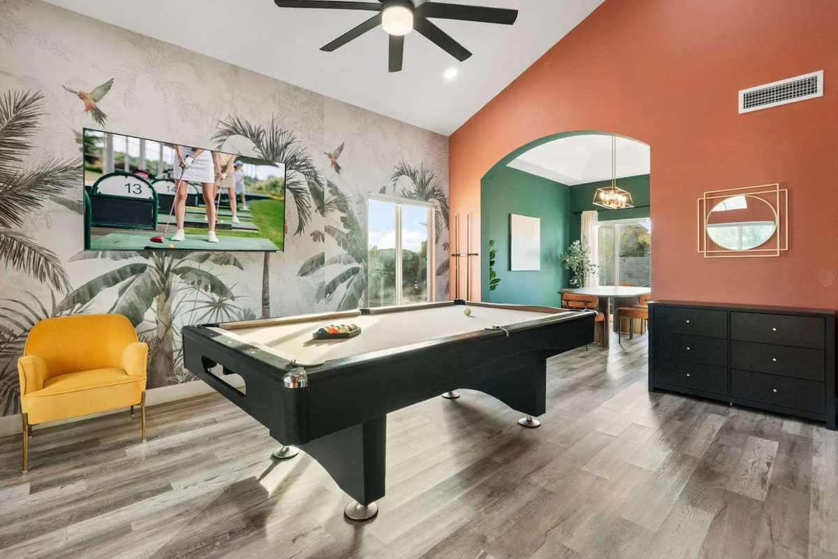 Game room with pool table, golf simulator, and entertainment lounge—the ultimate hangout space.