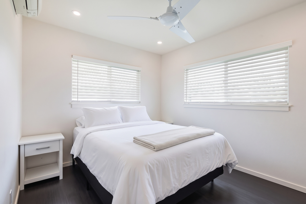 Queen Bedroom | Representative Interior. Unit finishes, furnishings, and decor may vary.