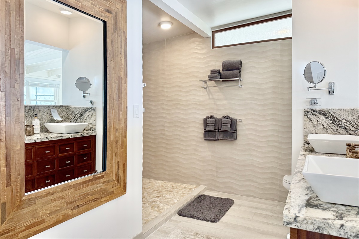 A spacious walk-in shower.