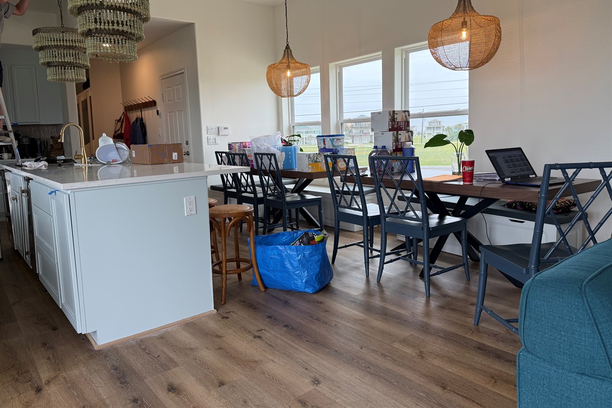 I apologize for all the riff raff but the time I could spend moving it for a better photo ....well It didn't seem to make sense.  But what does make sense is the beautiful chandeliers and seating for 20 so that everyone can enjoy dining together! 5/7/26
