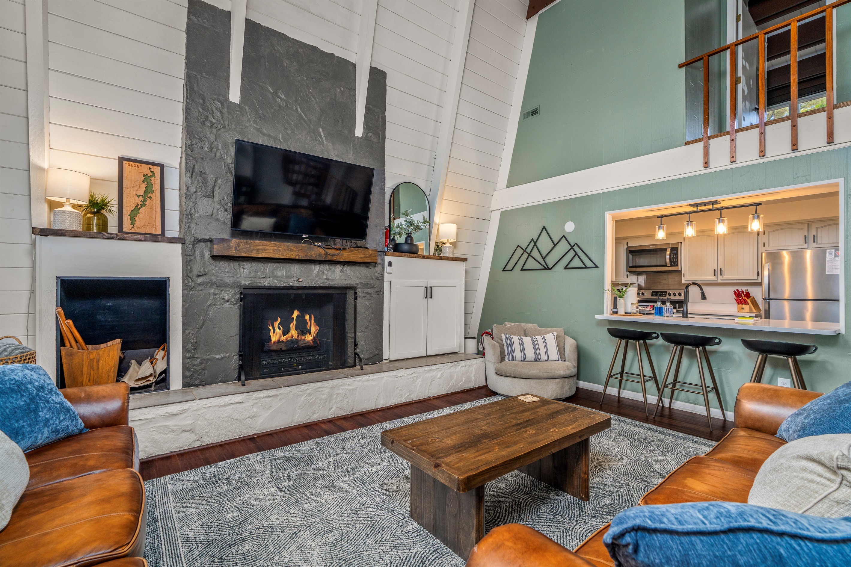 Designer-decorated great room with vaulted ceilings