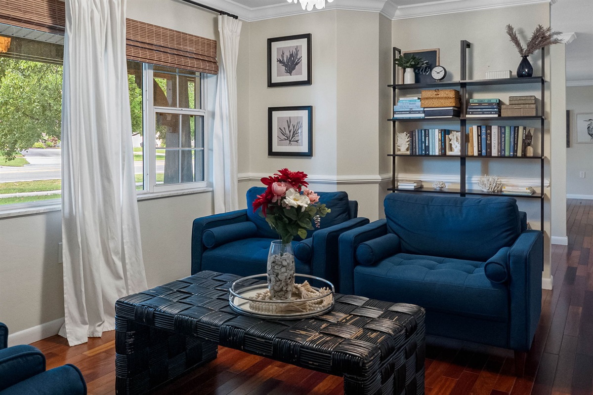 With its comfortable seating arrangement and tasteful décor, this family room is perfect for casual conversations or game nights.