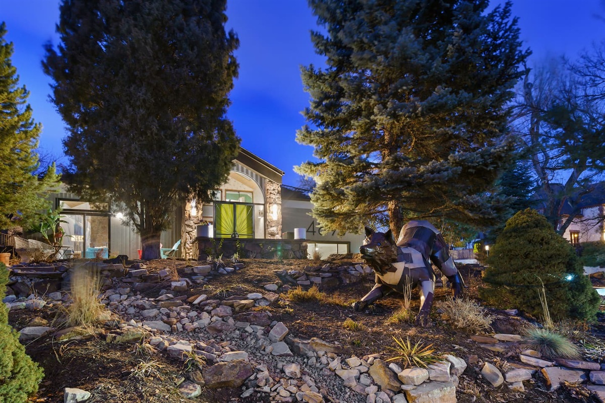 Street view, featuring artistic fox sculpture. 