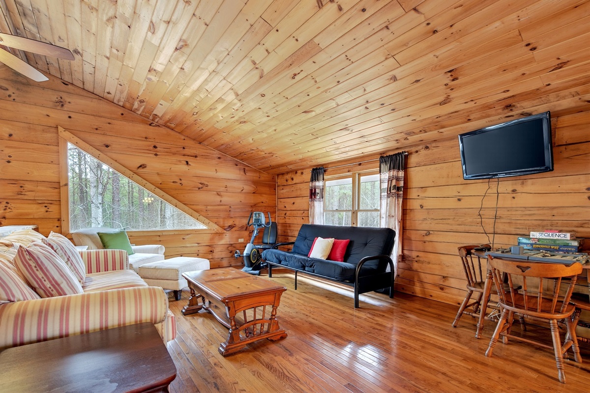 There is an exercise bike in the loft along with board games and a TV with Roku