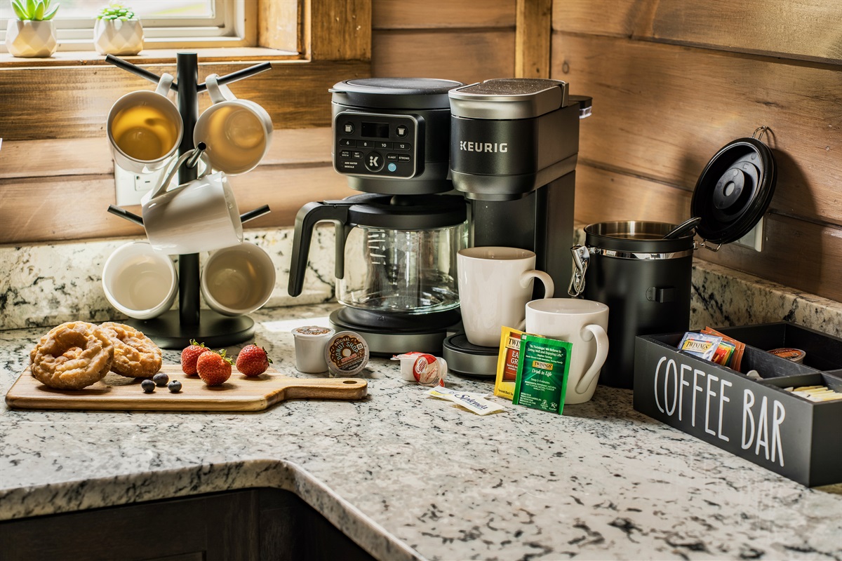 Fully stocked kitchen with pots, pans, rice cooker, blender, Toaster, crockpot, Keurig coffee machine and drip coffee machine