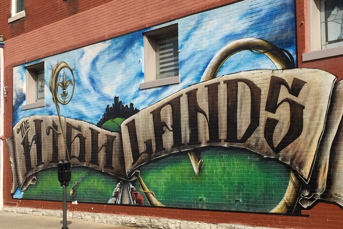 Mural on the side of Wick's Pizza