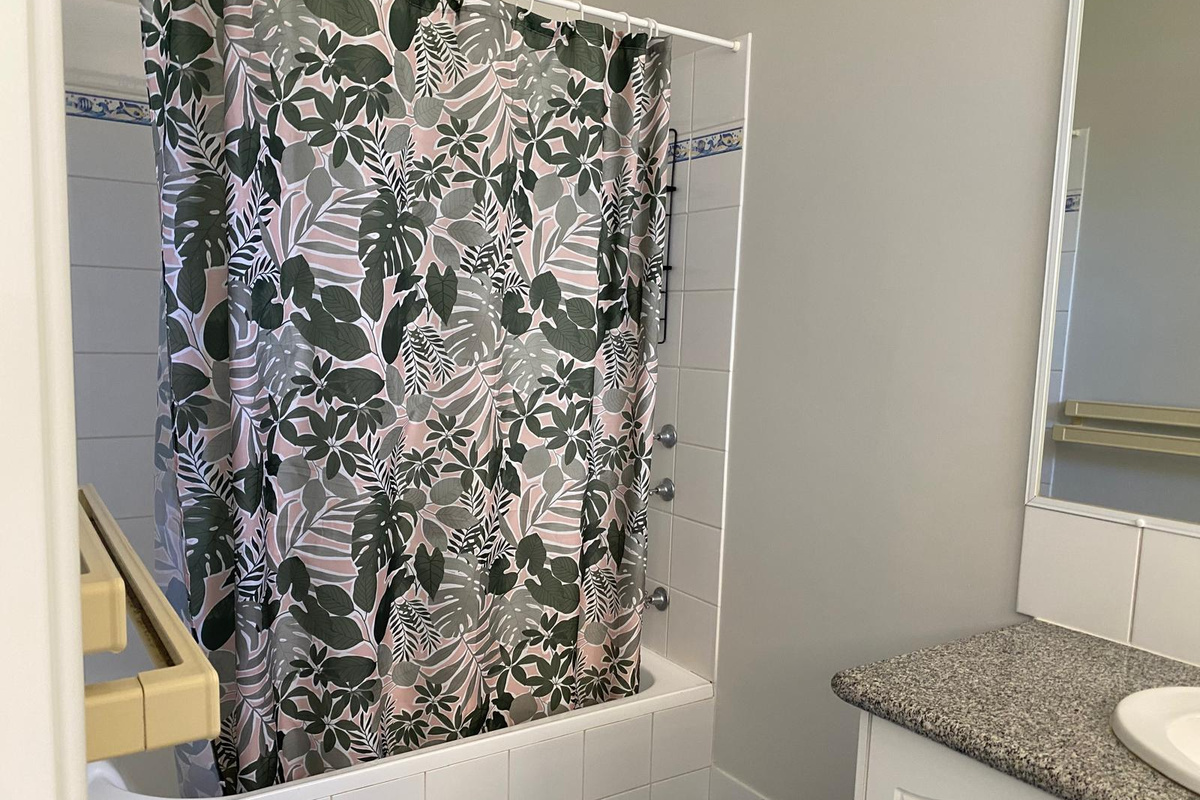 Main Bathroom downstairs with Bath
