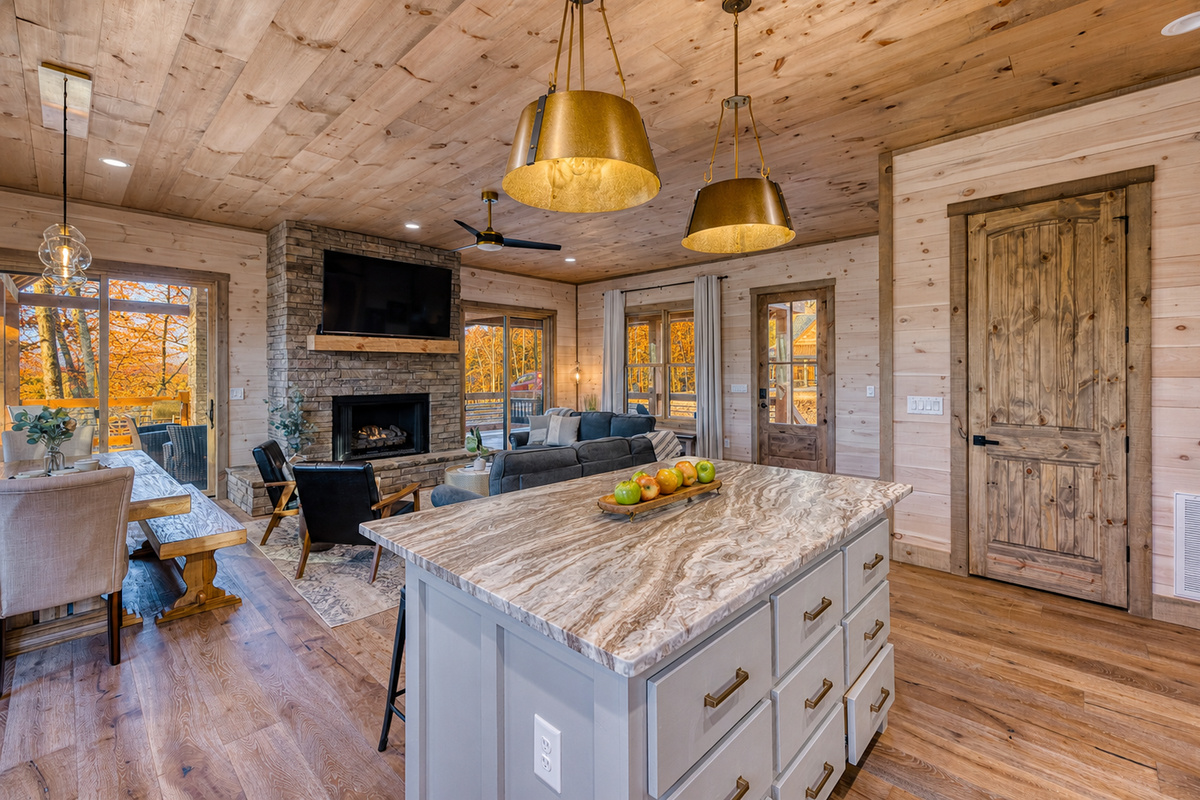 Kitchen overlooks living room and dining area