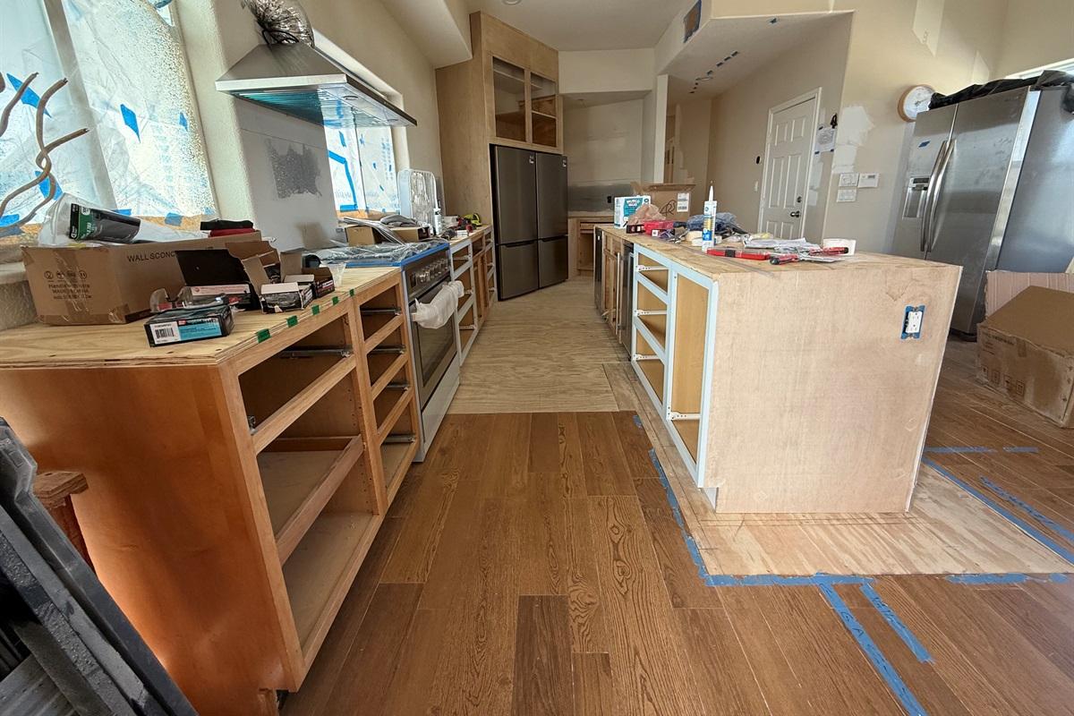 Gas Range is installed, drawers are removed to protect the fresh paint, quartz countertops are being installed this week! Plank flooring throughout!  Cabinet Paint is either first or last - so it is last on this project! 4/6/26