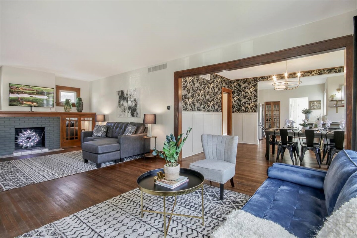 Living Room with vintage charm and spacious seating for large groups.