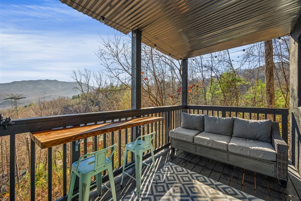 The lower deck offers views and comfortable seating along with the hot tub.  Soak a little then cool down and repeat!