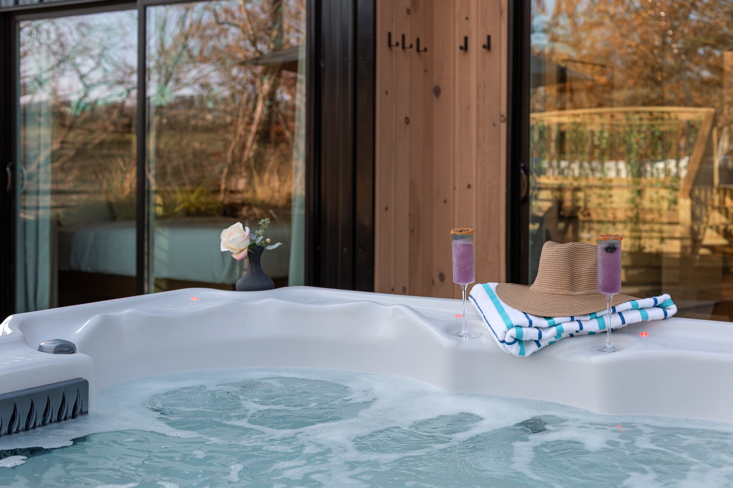 {Hot Tub} Sink into the Gallery House hot tub—plush towels, chilled drinks, and a serene mountain backdrop set the scene for effortless relaxation.