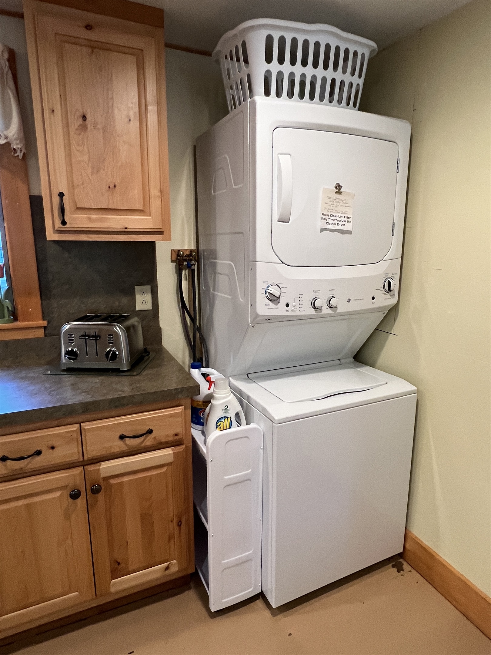 Washer/dryer in the kitchen area.