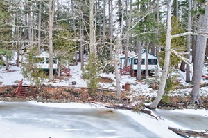 A view from the water looking at the cabins and shared water front on Toddy Pond