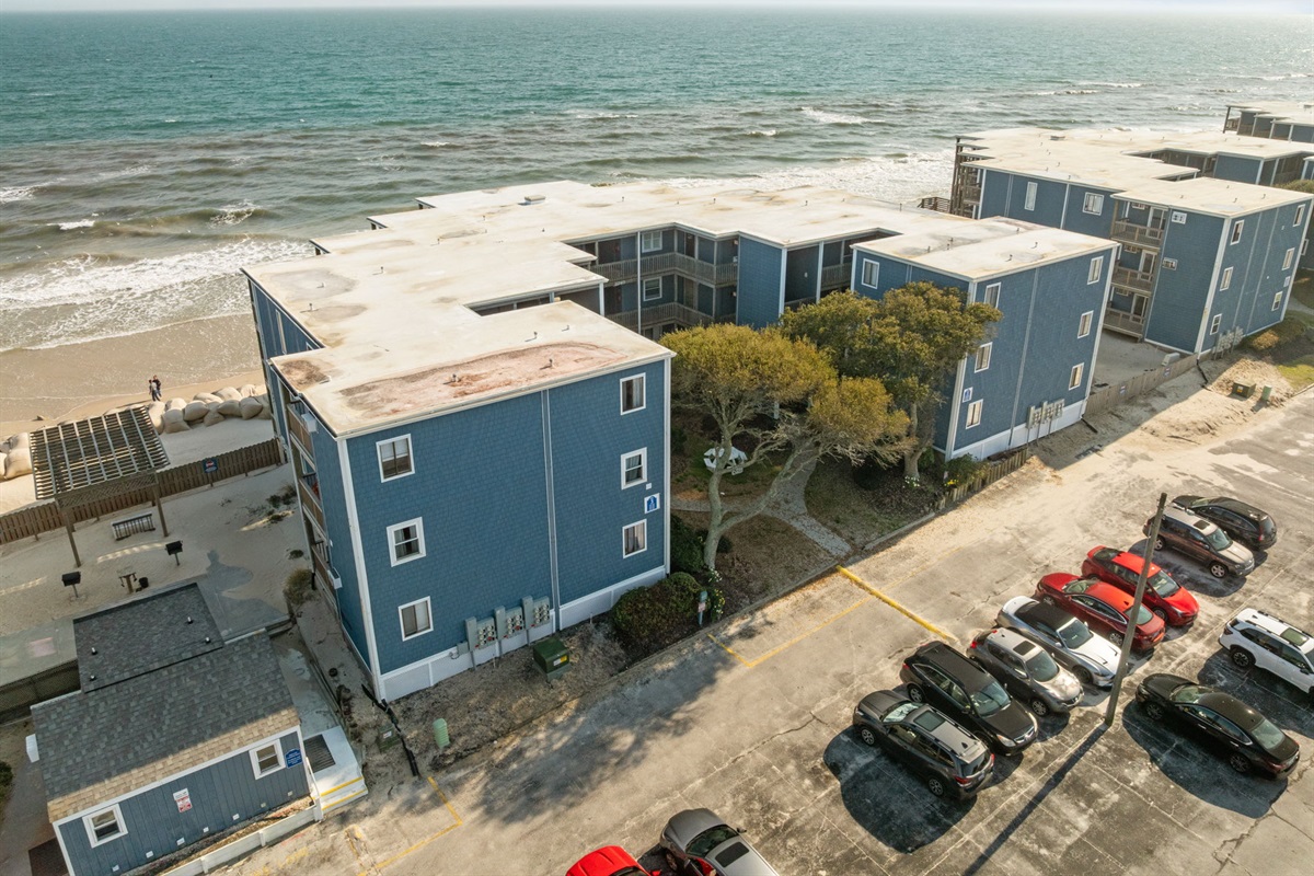 Aerial view of the complex with convenient on-site parking off New River Inlet Road