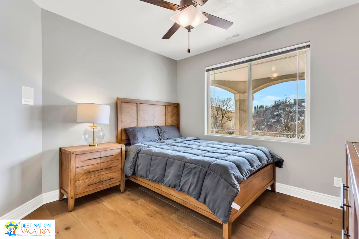 Cozy bedroom surrounded by beautiful views and natural light.