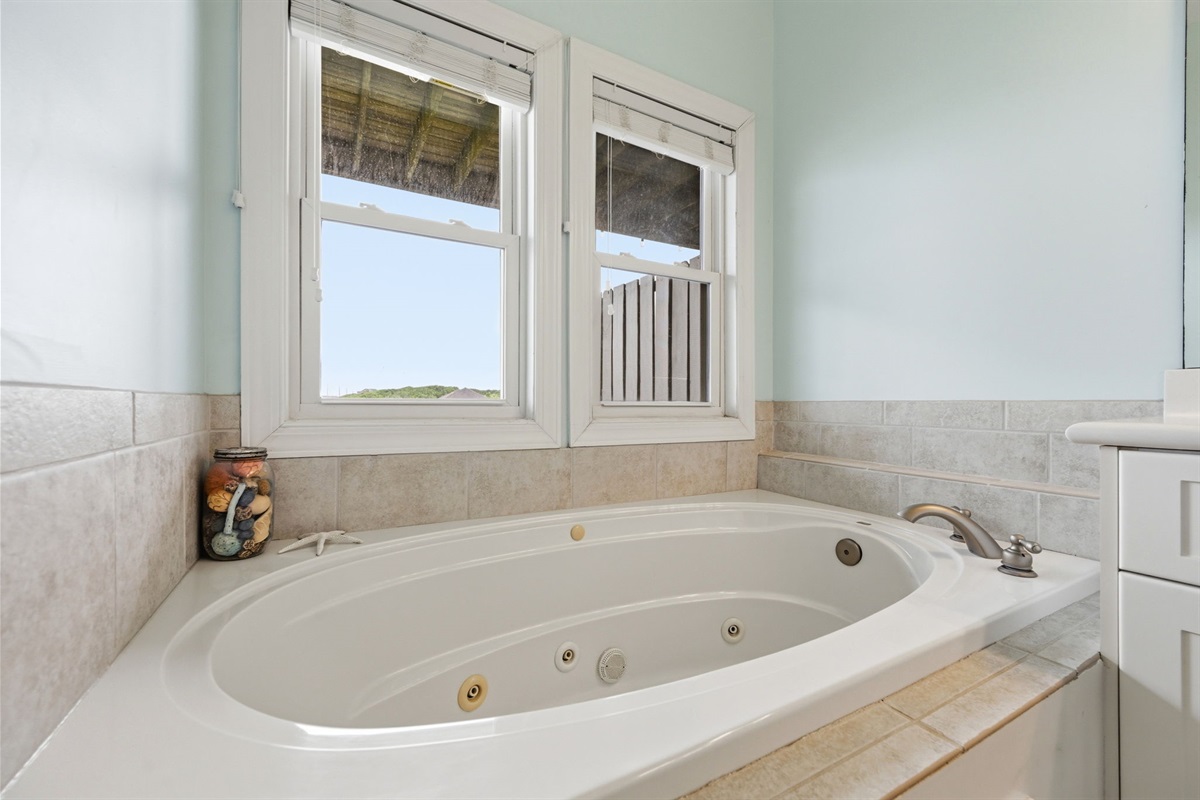 Relax and unwind in the soaking tub after a beach day