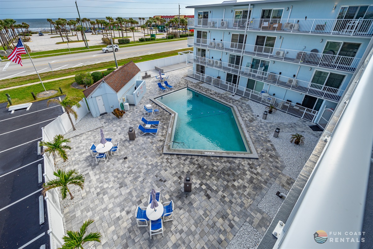 Balcony View: On-Site Newly-Renovated Pool