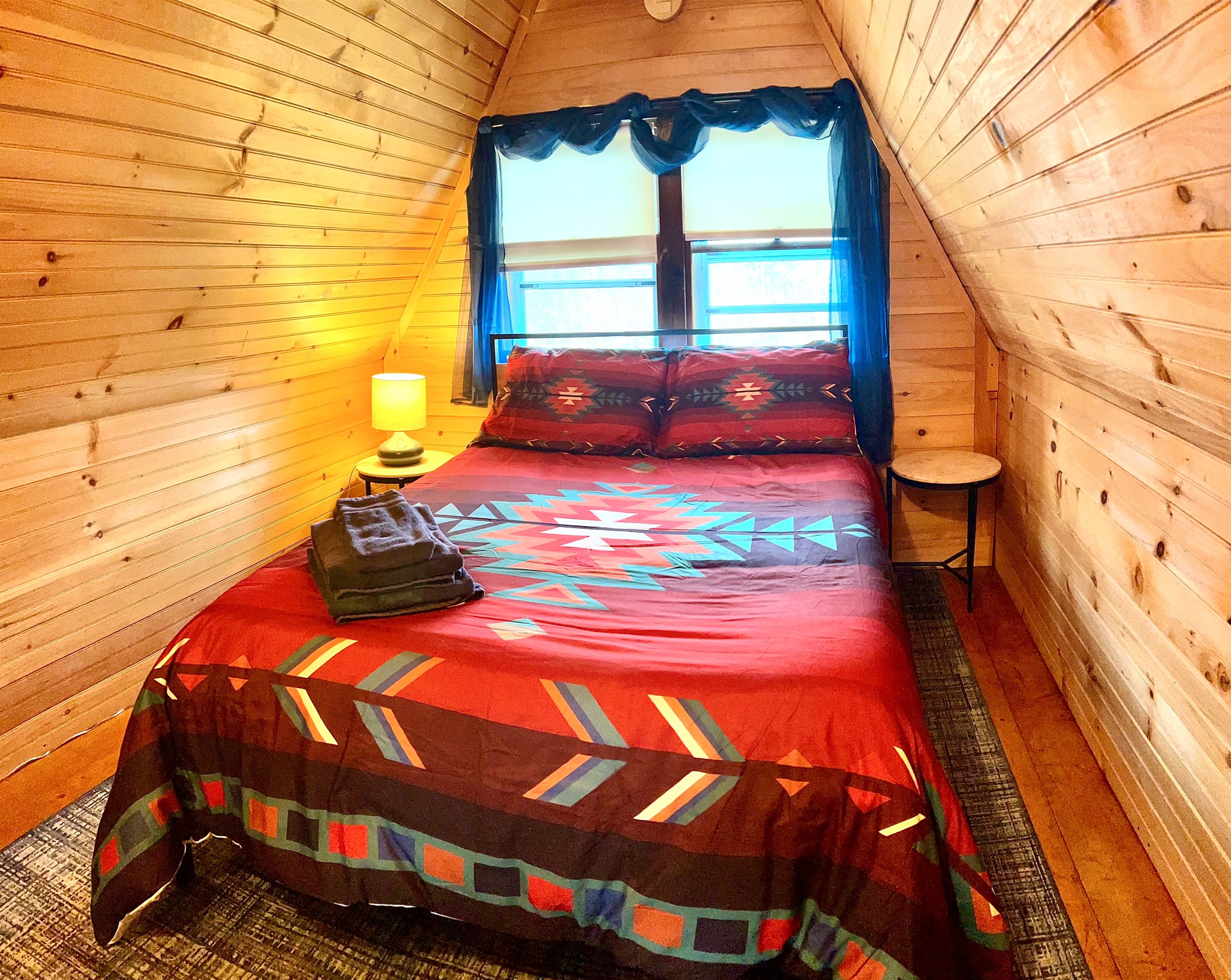 Second loft bedroom with full sized bed. Please note there is an open doorway between loft one and loft two.