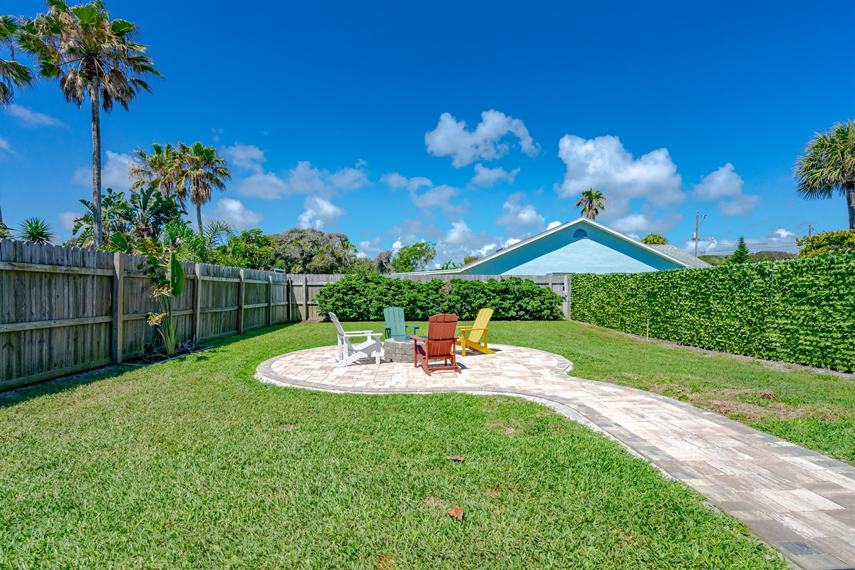 Island Time Fenced Backyard w/ Adirondack Chairs